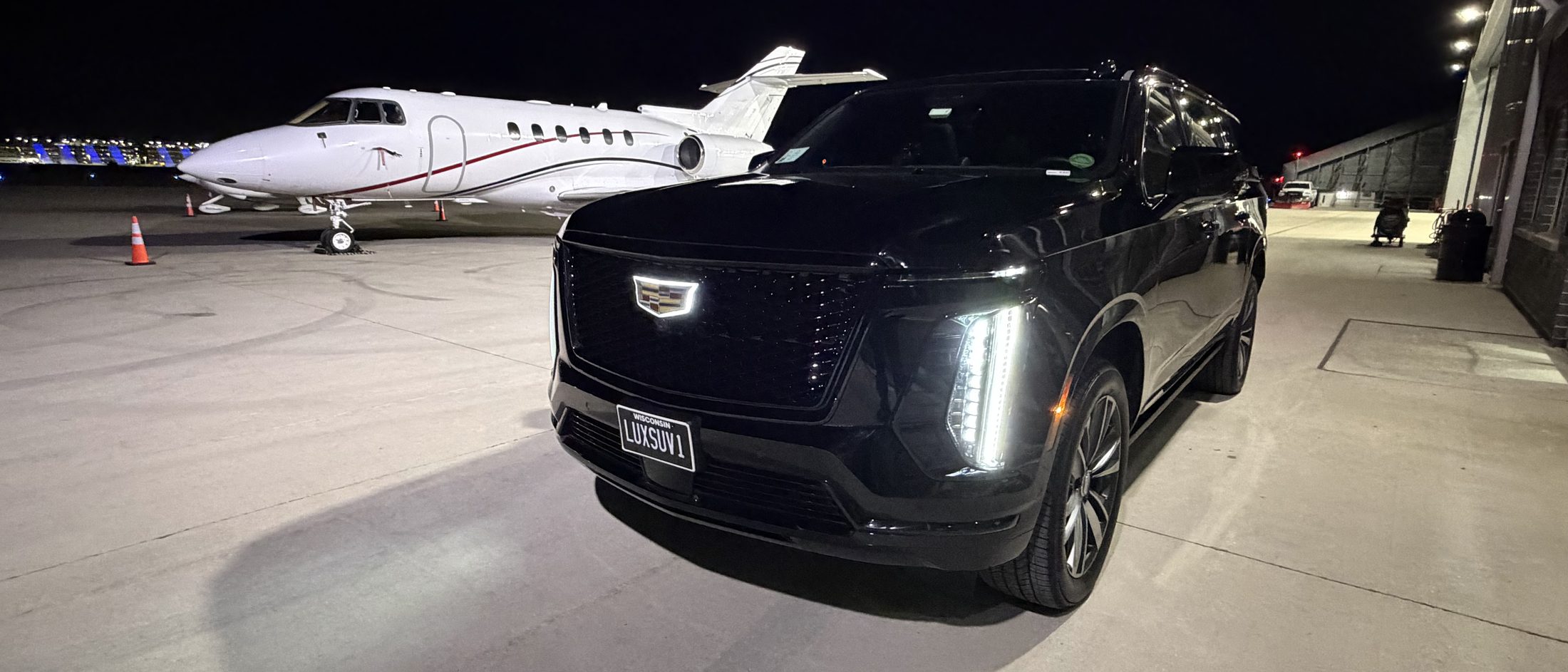 Black Cadillac Escalade ESV, full length body, in Milwaukee