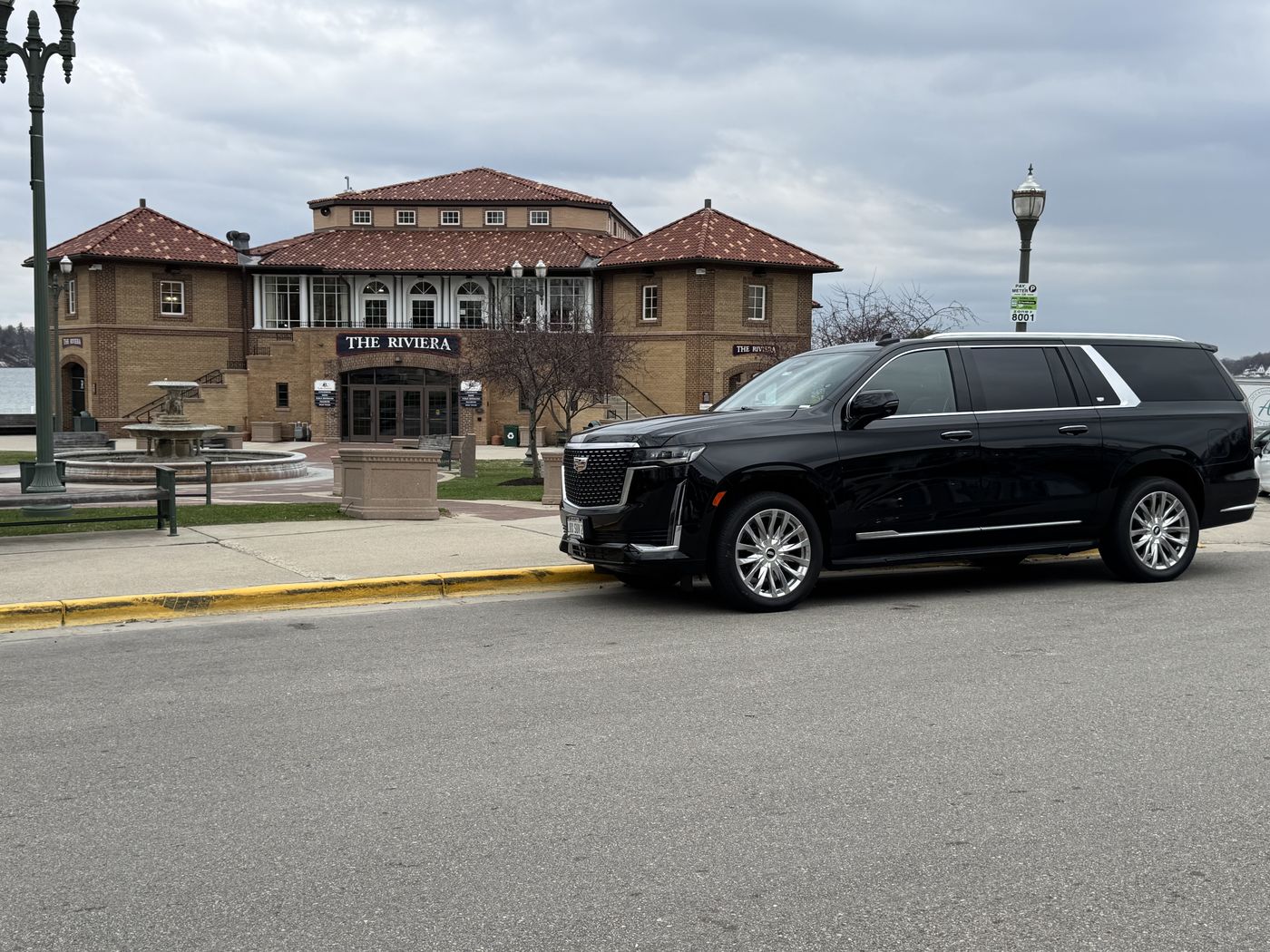 Black Cadillac Escalade ESV outside the Riviera on the Lake Geneva lakefront
